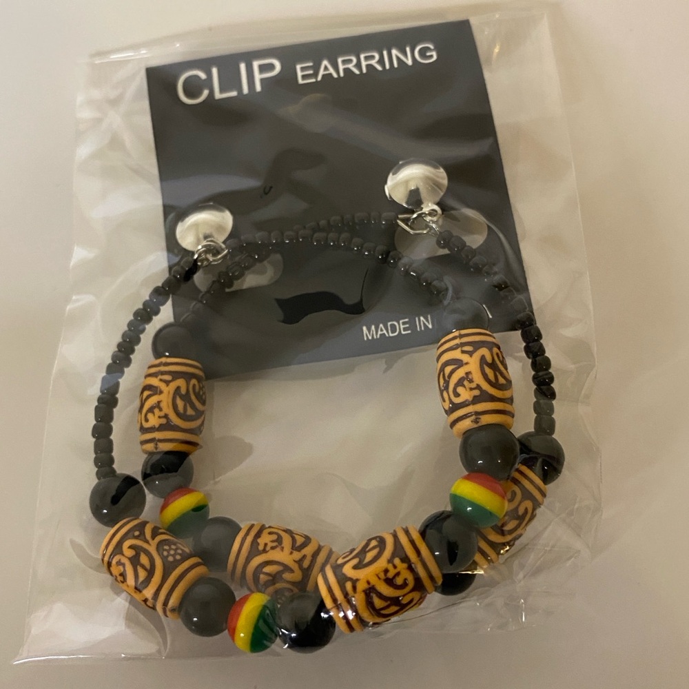 These beautiful Clip-On Tribal designed Earring with Black and Gold beads.